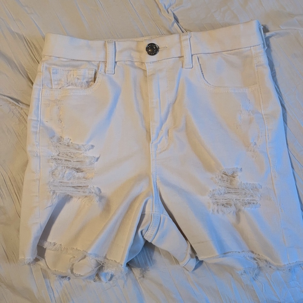 American Eagle distressed white shorts
